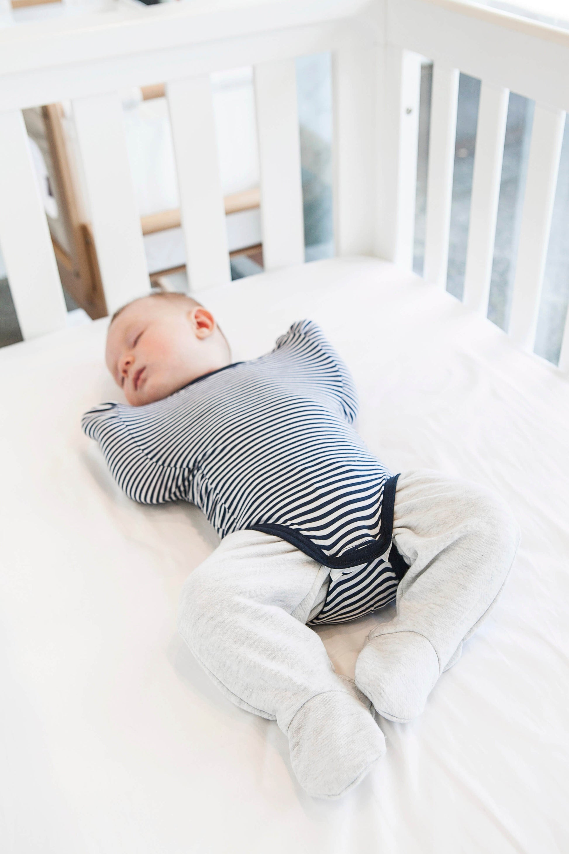 legs out swaddle layered